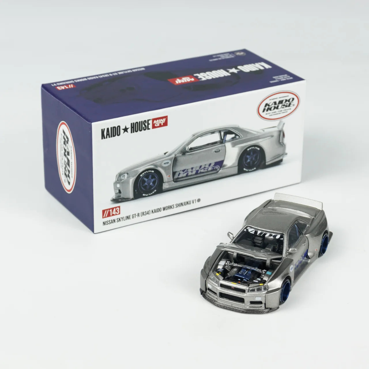 Kaido House + MINIGT Nissan Skyline GT-R (R34) Kaido Works SHINJUKU V1 KHMG143