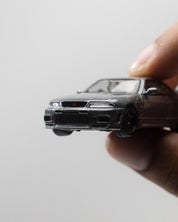 MINIGT 1/64 - NISSAN Skyline GT-R Dark Metal Gray (NISMO BCNR33 CRS Version)