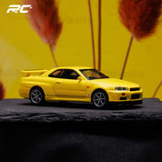 MINIGT 1:64 Nissan Skyline GT-R (R34) V-Spec Lightning Yellow