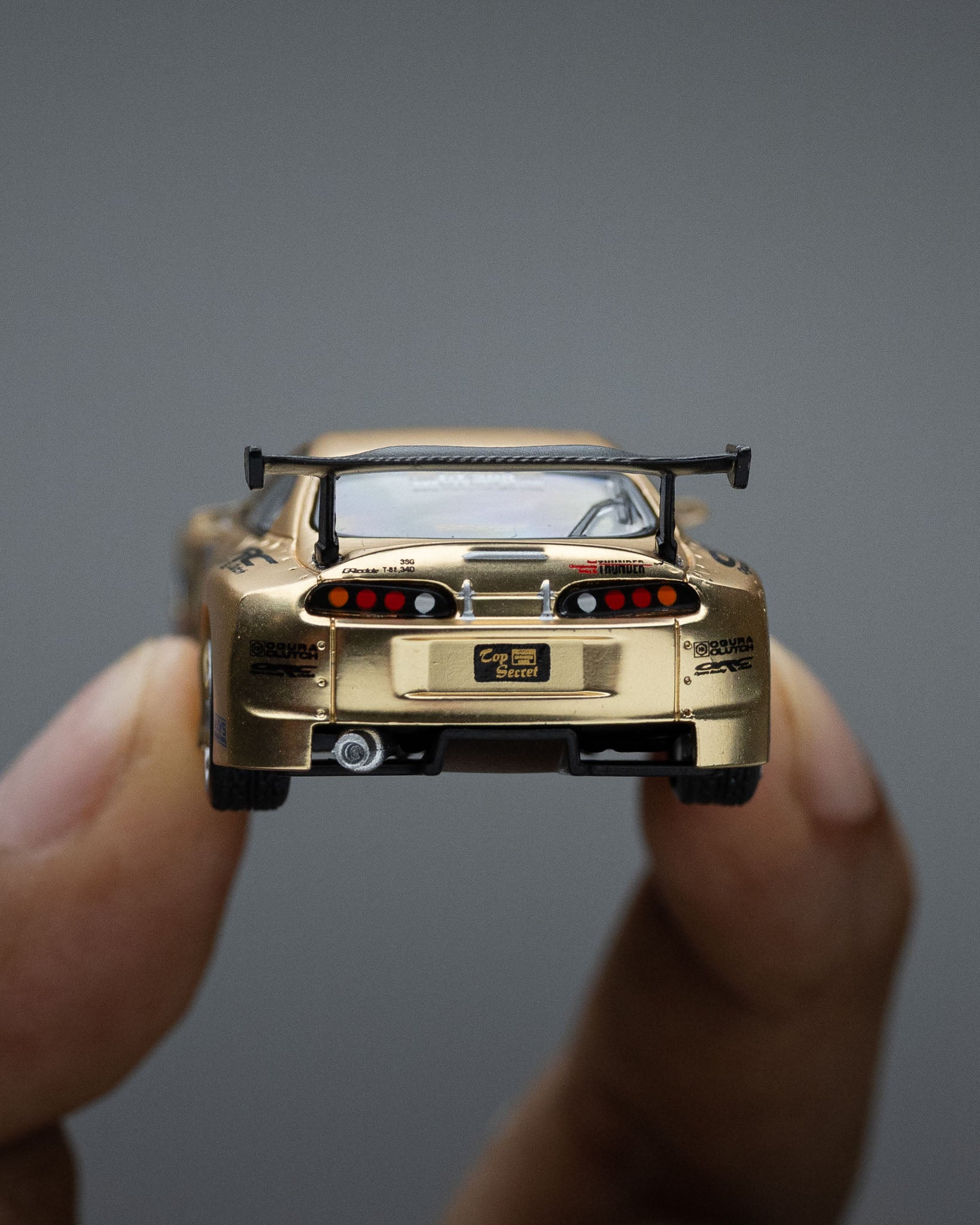 POP RACE 1:64 TOP SECRET GT300 SUPRA CHROME GOLD / CARBON HOOD